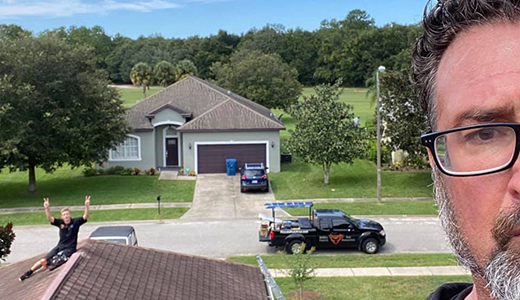 Pest Control Experts Working on the Roof of Hernando County House